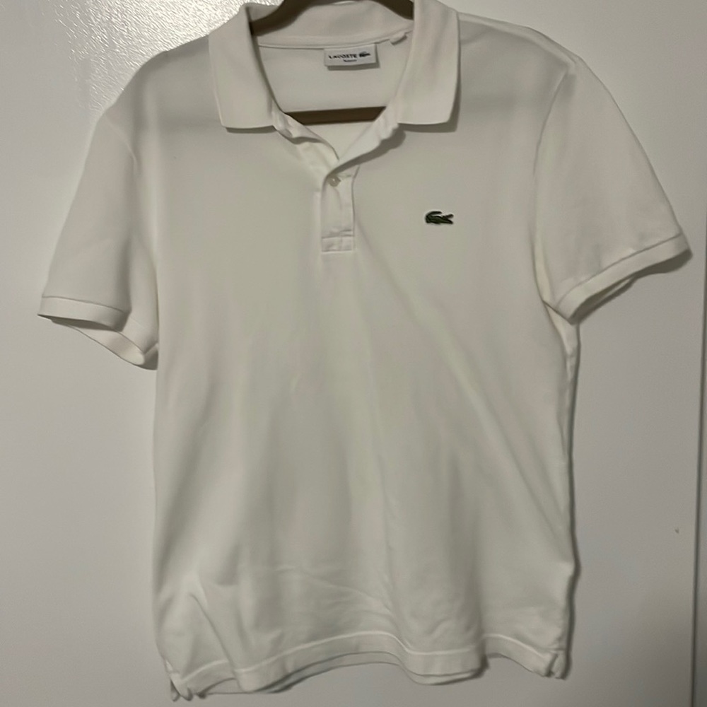 Lacoste , white polo , size m , good condition